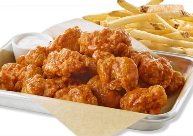 Buffalo Chicken Fingers with Fries.
